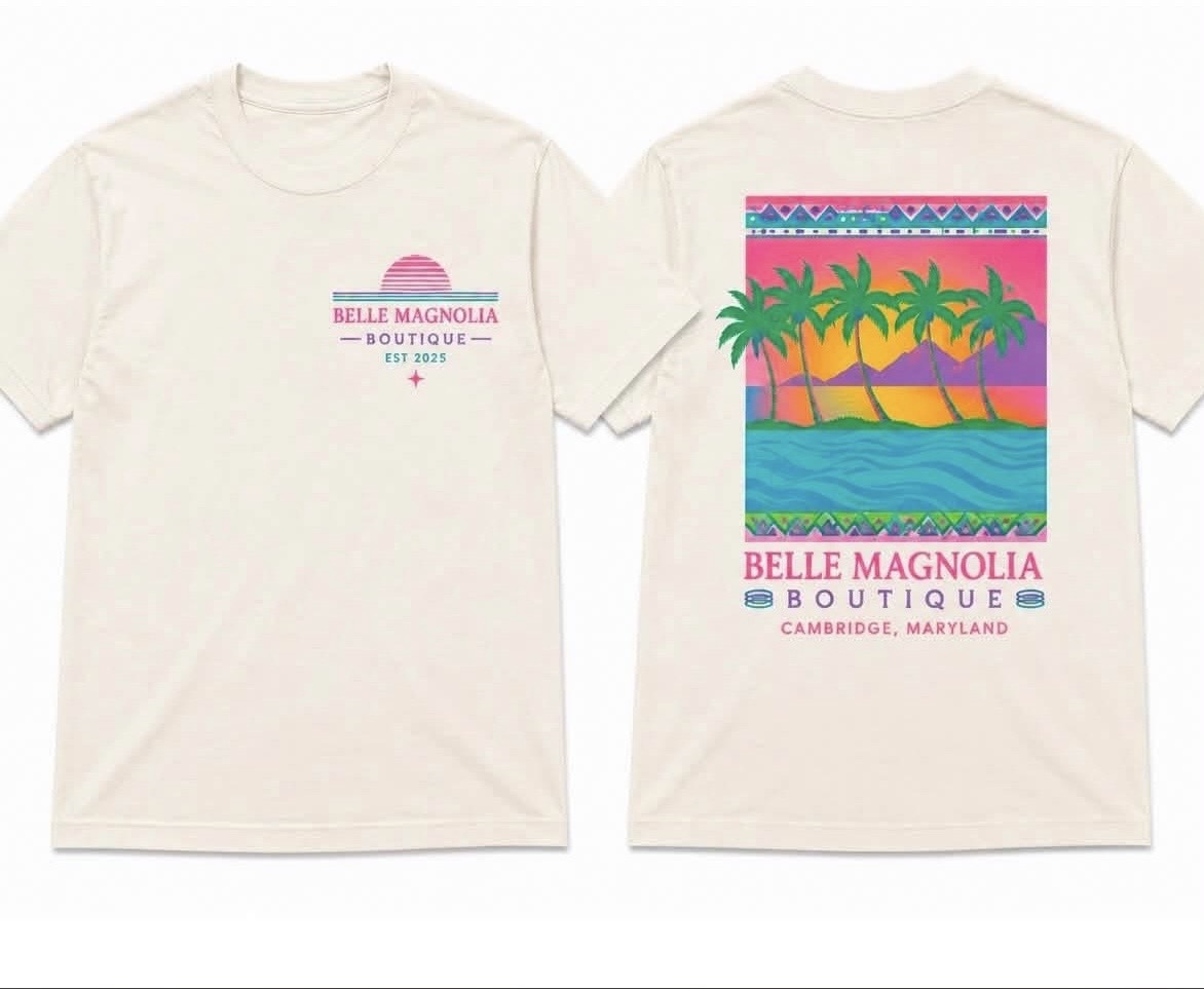 Tropical Sunset ivory tee, front and back, featuring colorful palm trees and ocean artwork