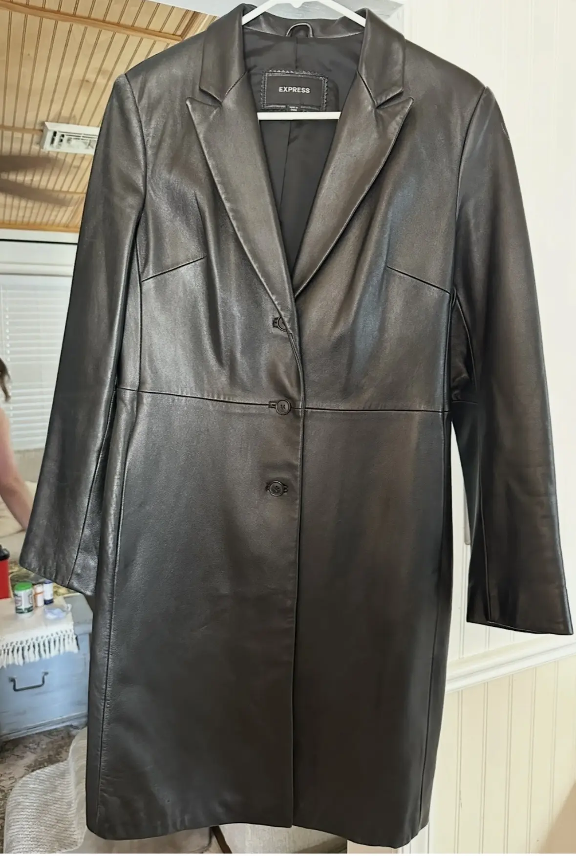 Long black Express leather-look tailored coat with lapels and front buttons