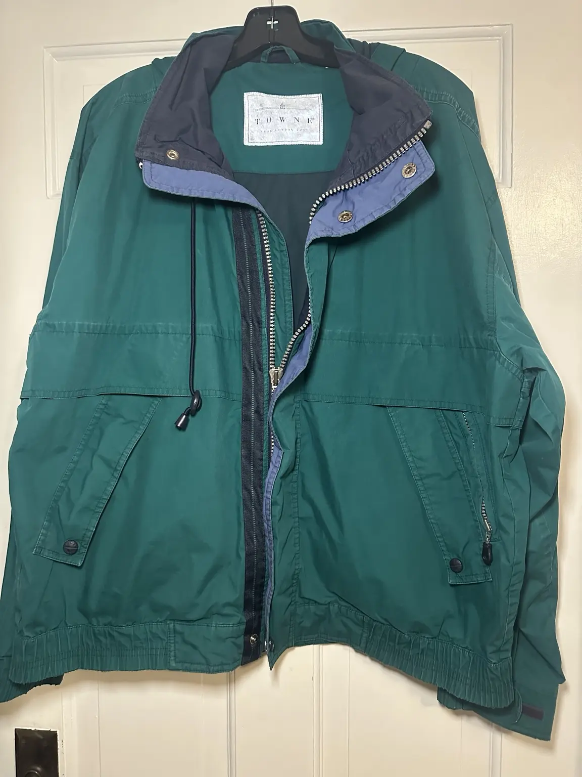 Front view of teal-green Towne by London Fog windbreaker jacket